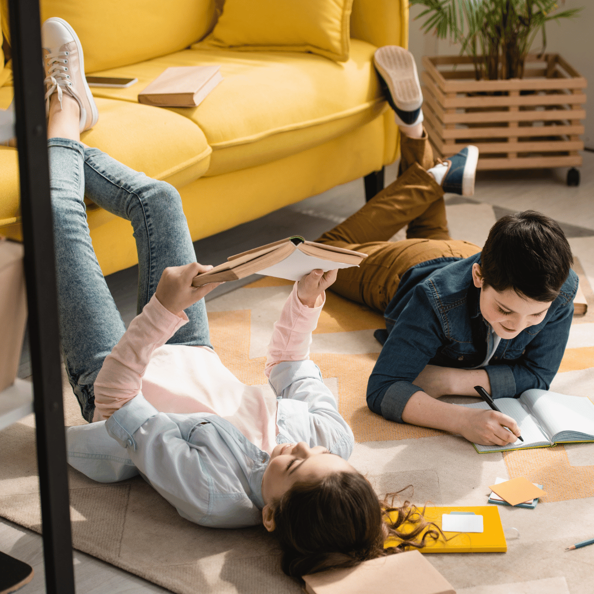 kids reading on the floor, sprawled out comfortably together